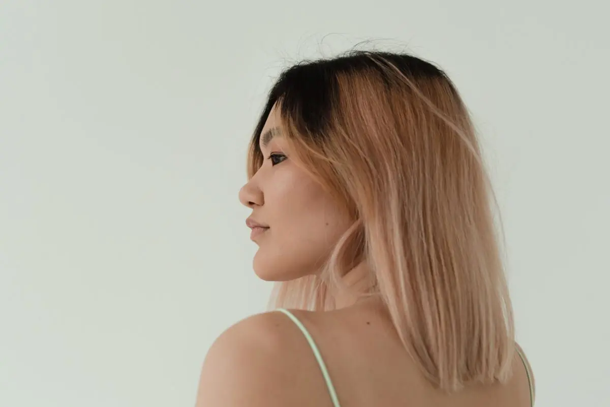 Sunlit blonde hair shown in profile