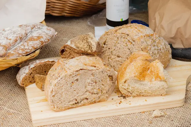 Rustic sliced loaves on a wooden board