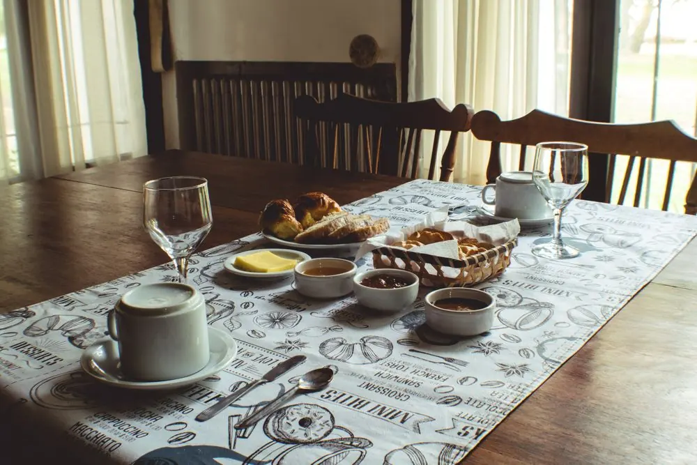 Breakfast setting on a rustic wooden dining table